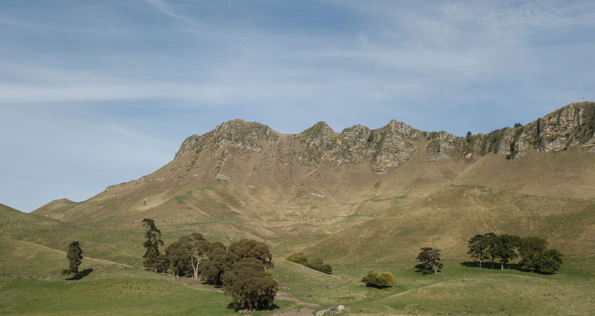 The farm below the limestone cliffs